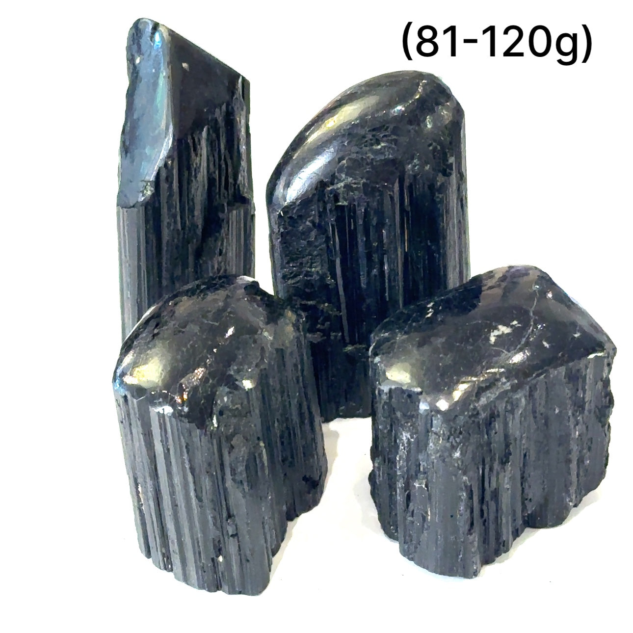 Ethically sourced Black Tourmaline raw gemstone with polished point grouping of gemstone (81-120g) on white front overview