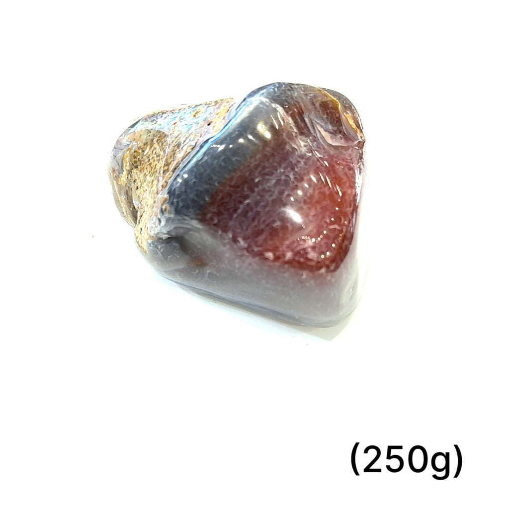 Ethically sourced Malawi Agate tumbled gemstone with natural earthy tones gemstone (250g) on white overview 