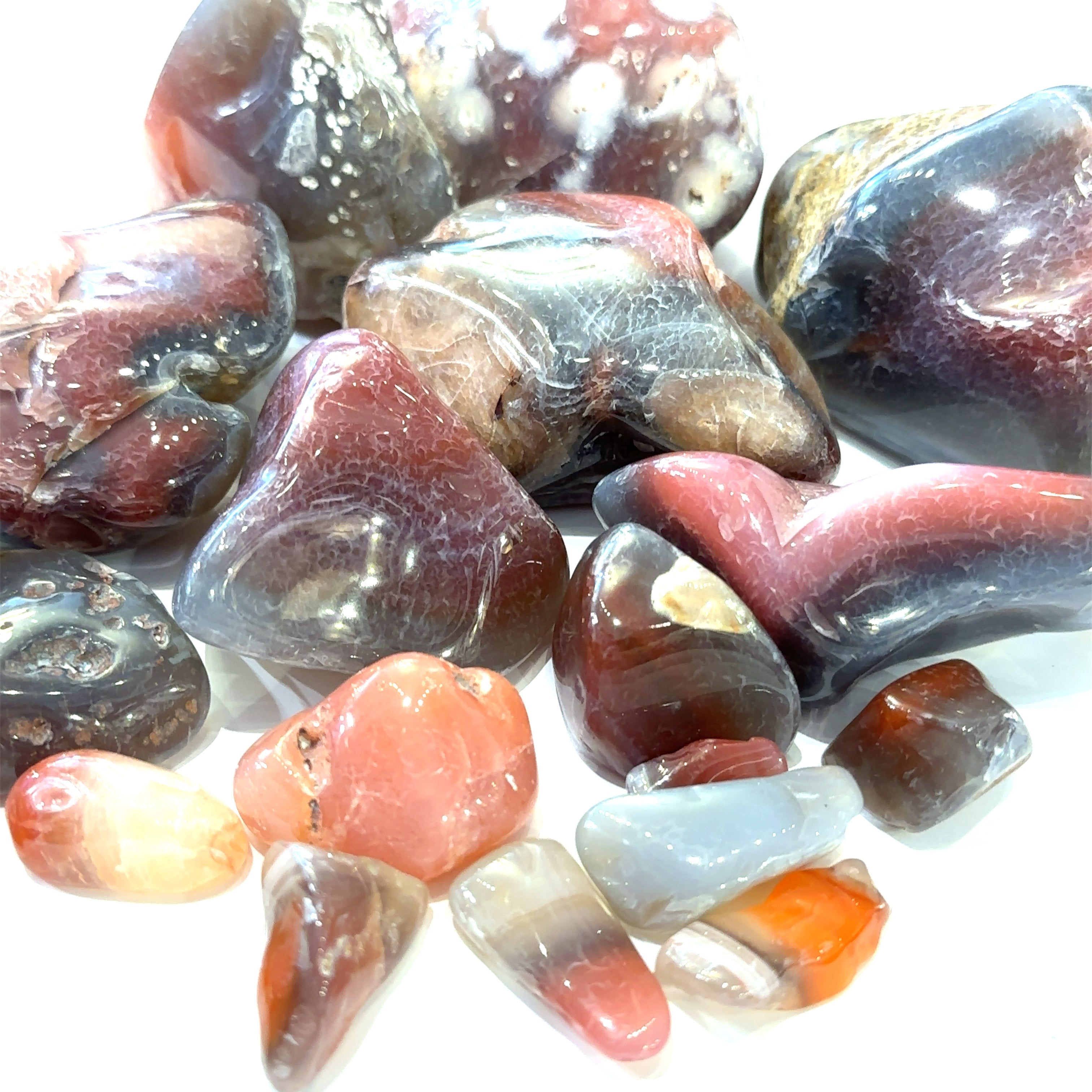 Ethically sourced Malawi Agate tumbled gemstone with natural earthy tones grouping of gemstone on white overview 