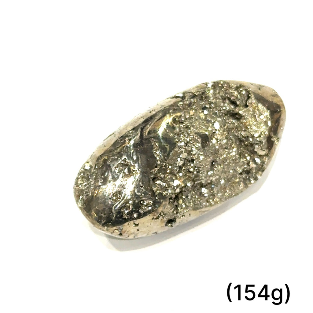Ethically sourced Pyrite free-form gemstone glowing with golden tones, symbolizing manifestation, vitality, and confidence on white (154g) front up close view