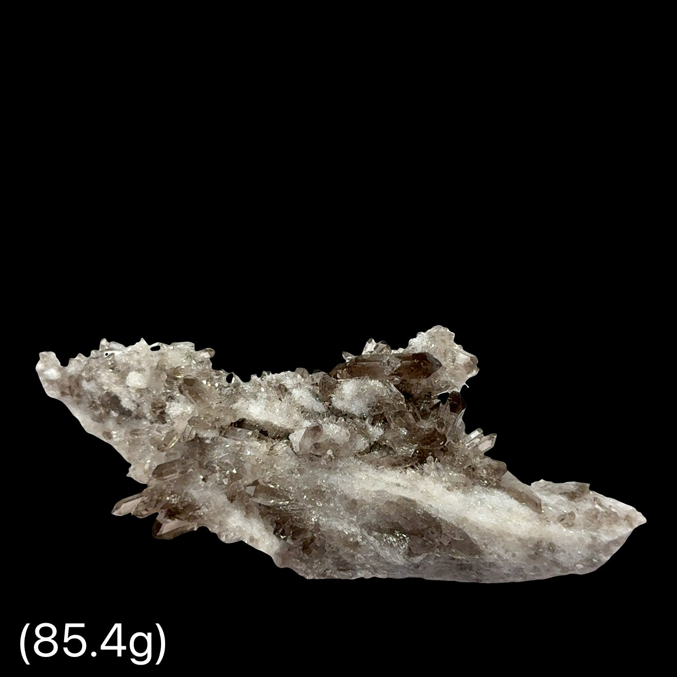 Ethically sourced Smokey Quartz druzy point for root chakra healing weighs (85.4g), on a black background, front view.