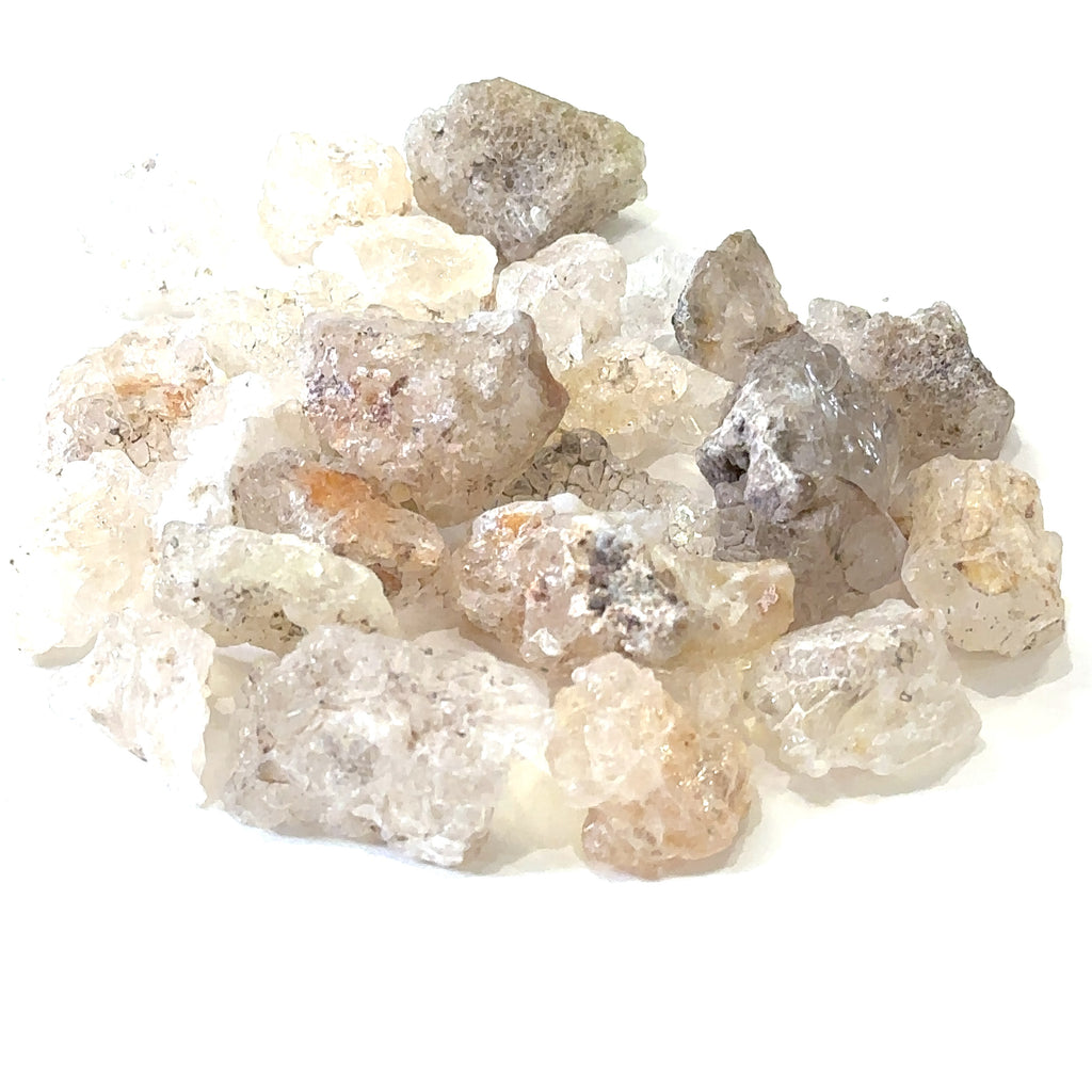 Ethically sourced raw Hyalite Opal gemstone with luminous glow grouping center overview