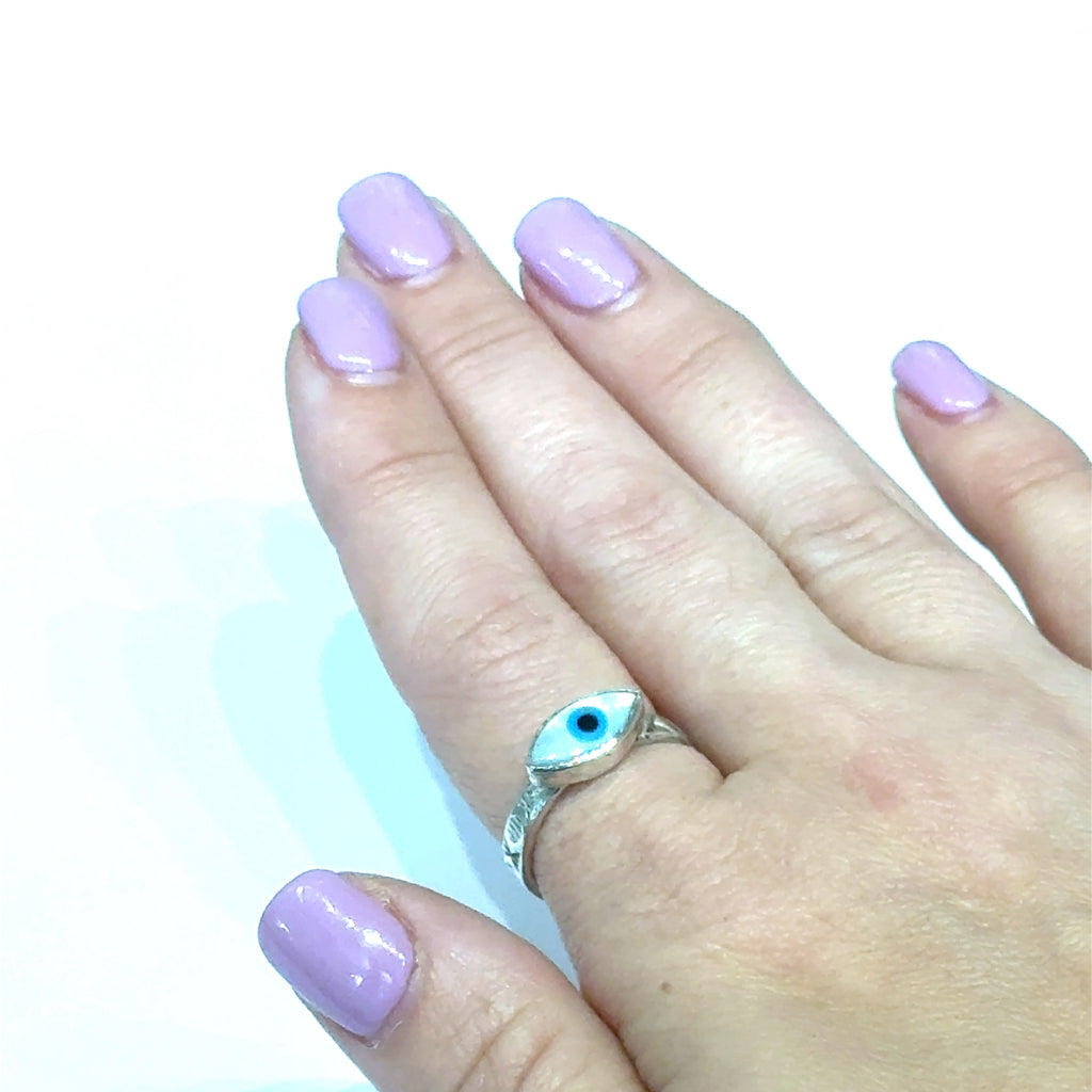 Evil‑Eye Mother‑of‑Pearl Ring on finger white front view