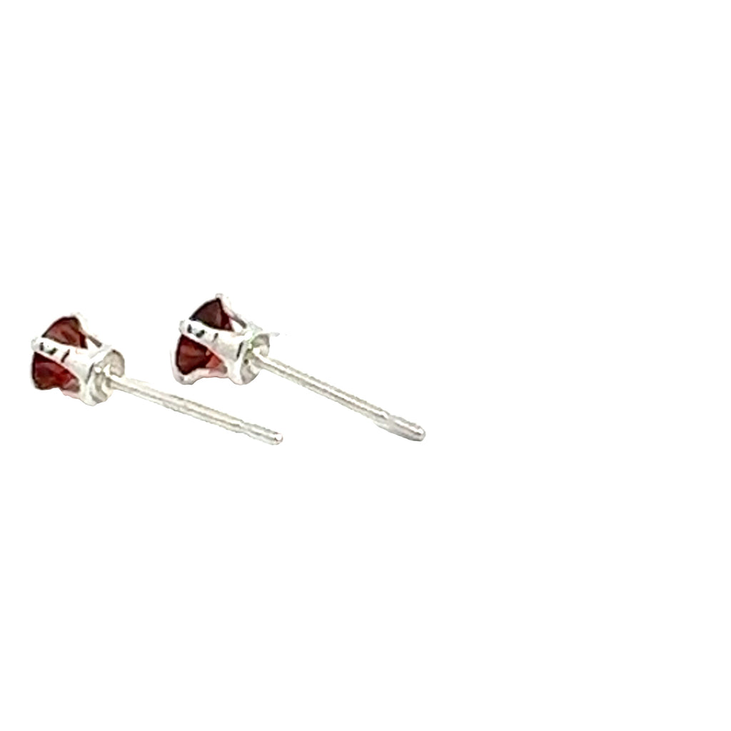 Faceted 4mm Garnet Post Earrings in Sterling Silver  Basket Setting 4 prong on white back left angled overview