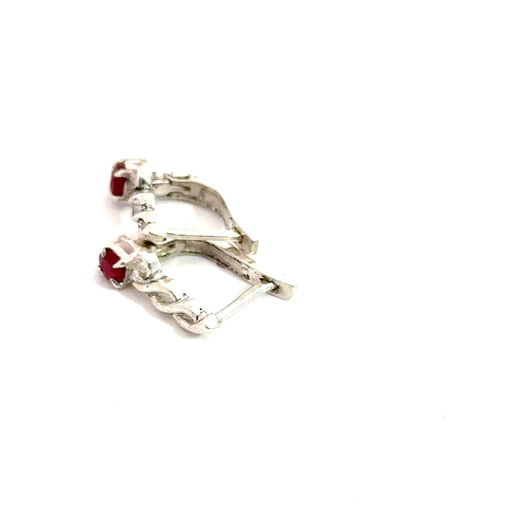 Faceted Ruby Snap‑Back Earrings on white  bottom side view