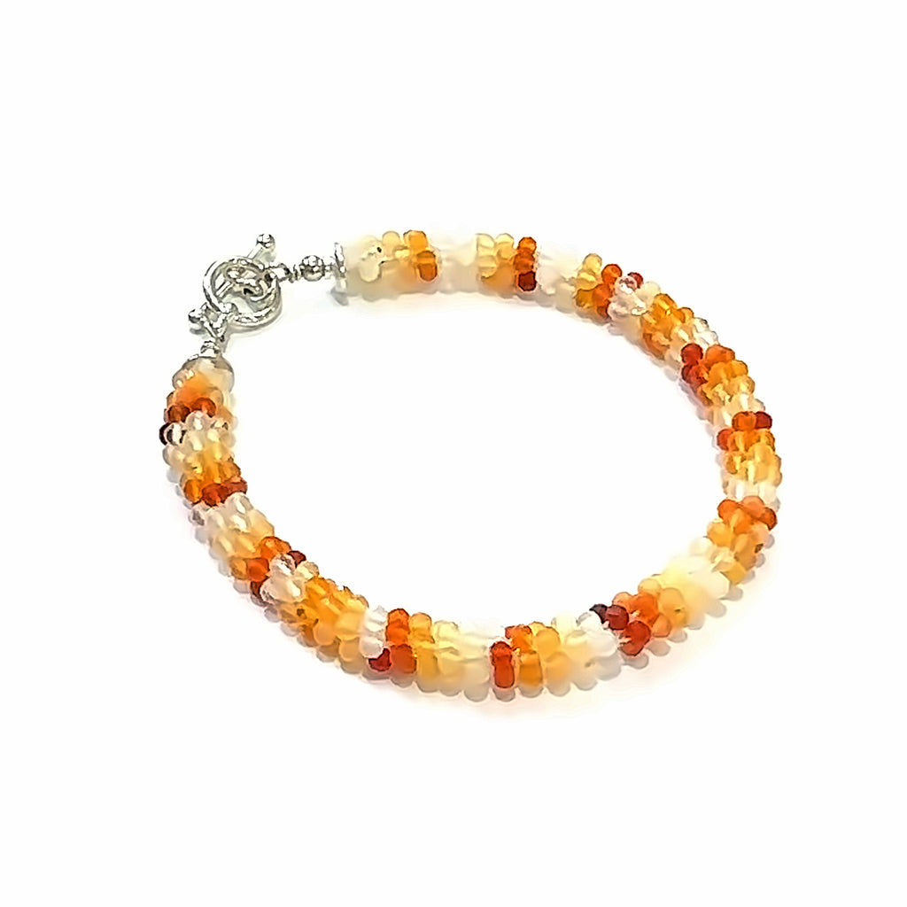 Fire Opal Crocheted Gemstone Bracelet on white left angle overview