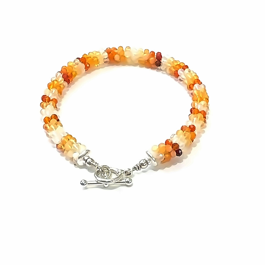 Fire Opal Crocheted Gemstone Bracelet on white top overview