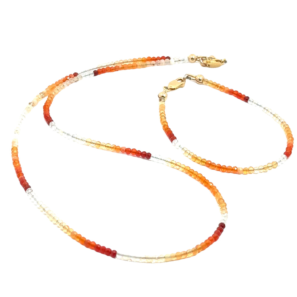 Fire Opal Gemstone Beaded Bracelet with matching necklace on white center overview