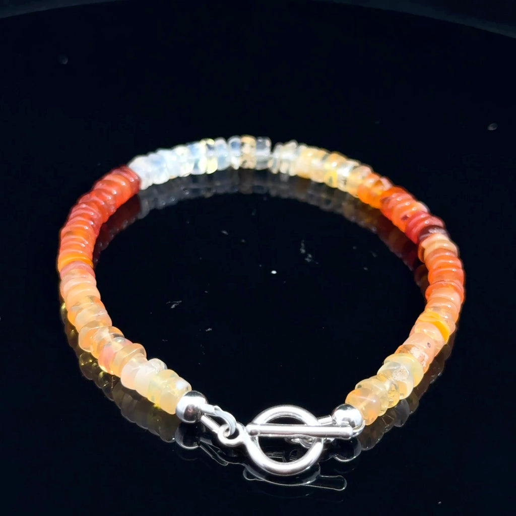 Fire Opal Gemstone bracelet  on black bottom side