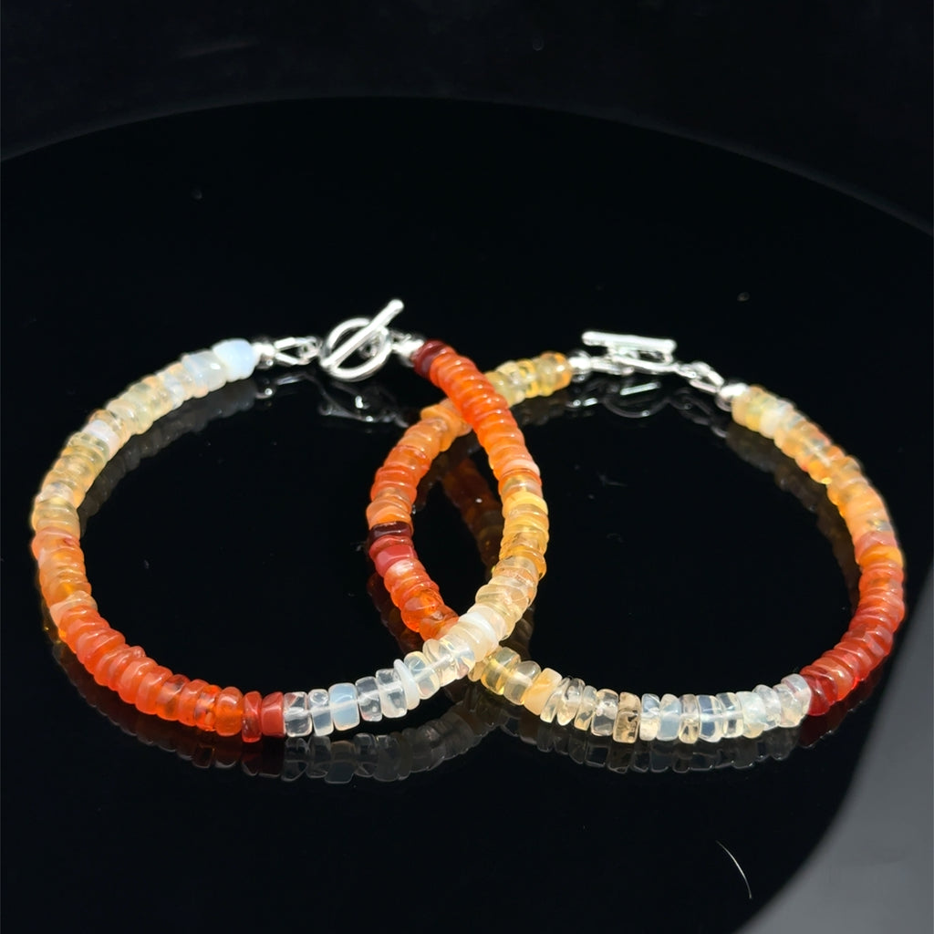 Fire Opal Gemstone bracelet on black front