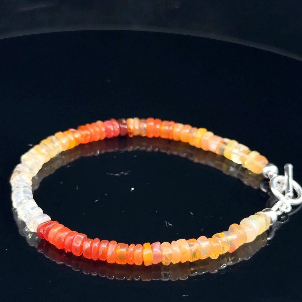 Fire Opal Gemstone bracelet  on black side