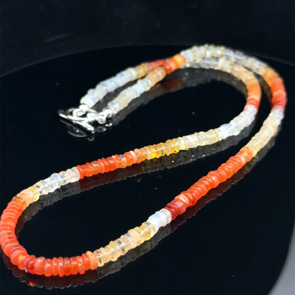 Fire Opal Gemstone necklace on black left side 