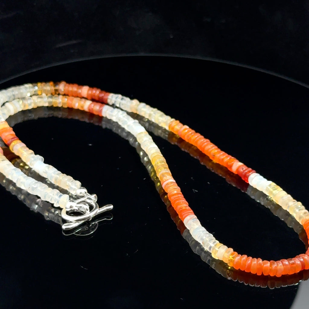 Fire Opal Gemstone necklace on black right side
