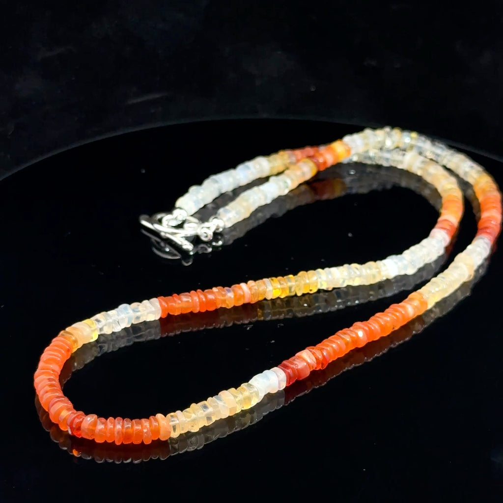 Fire Opal Gemstone necklace on black side
