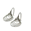 Five-circle graduated sterling silver earrings with diamond-cut finish on white background, front overview. 