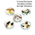 Five pack intention tea light candle set with rose quartz tiger's eye citrine amethyst aventurine crystals for manifestation affirmation ritual and self-love protection abundance clarity success, on a white background, front view. 