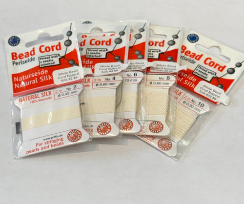 Five packages of White Natural Silk Bead Cord  #2, 4,  6, 8 & 10 on a white background, front view.