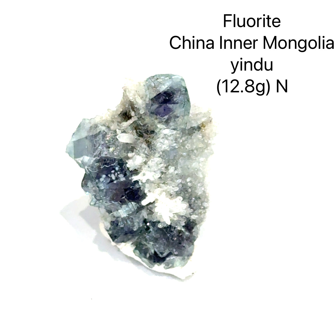 Fluorite crystal from China, Inner Mongolia, with weight and origin information on a white background, (12.8g) N front view. 