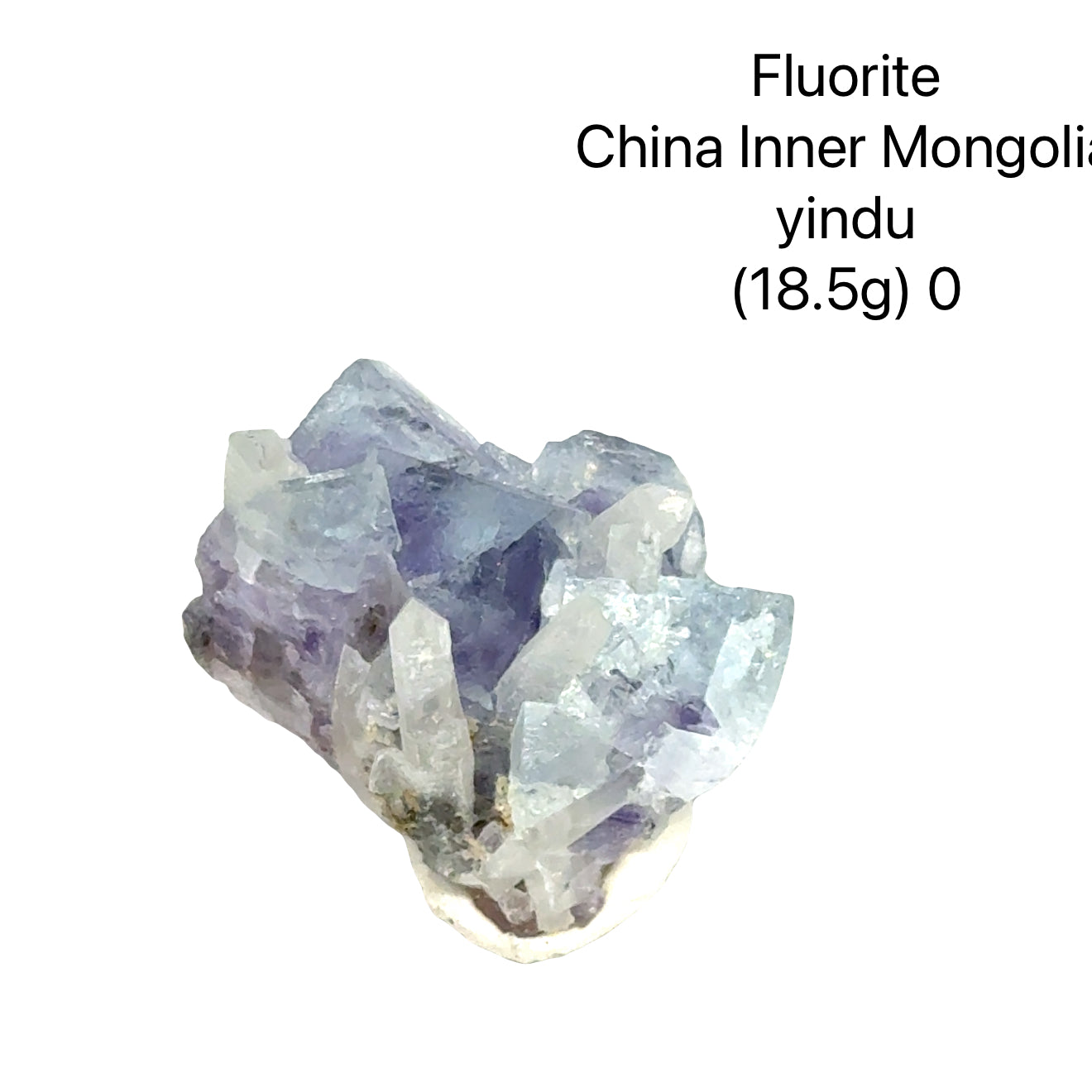 Fluorite crystal from China, Inner Mongolia, with weight and origin information on a white background, (18.5g) O front view. 