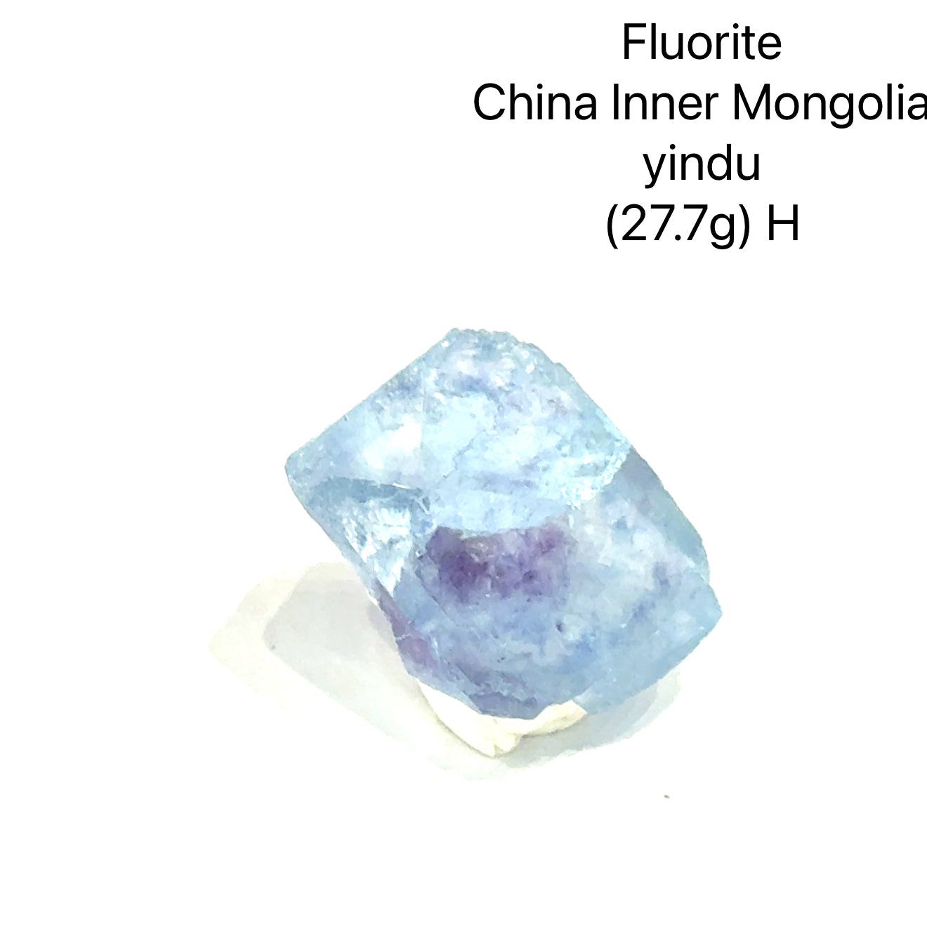 Fluorite crystal from China, Inner Mongolia, with weight and origin information on a white background, (27.7g) H front view. 