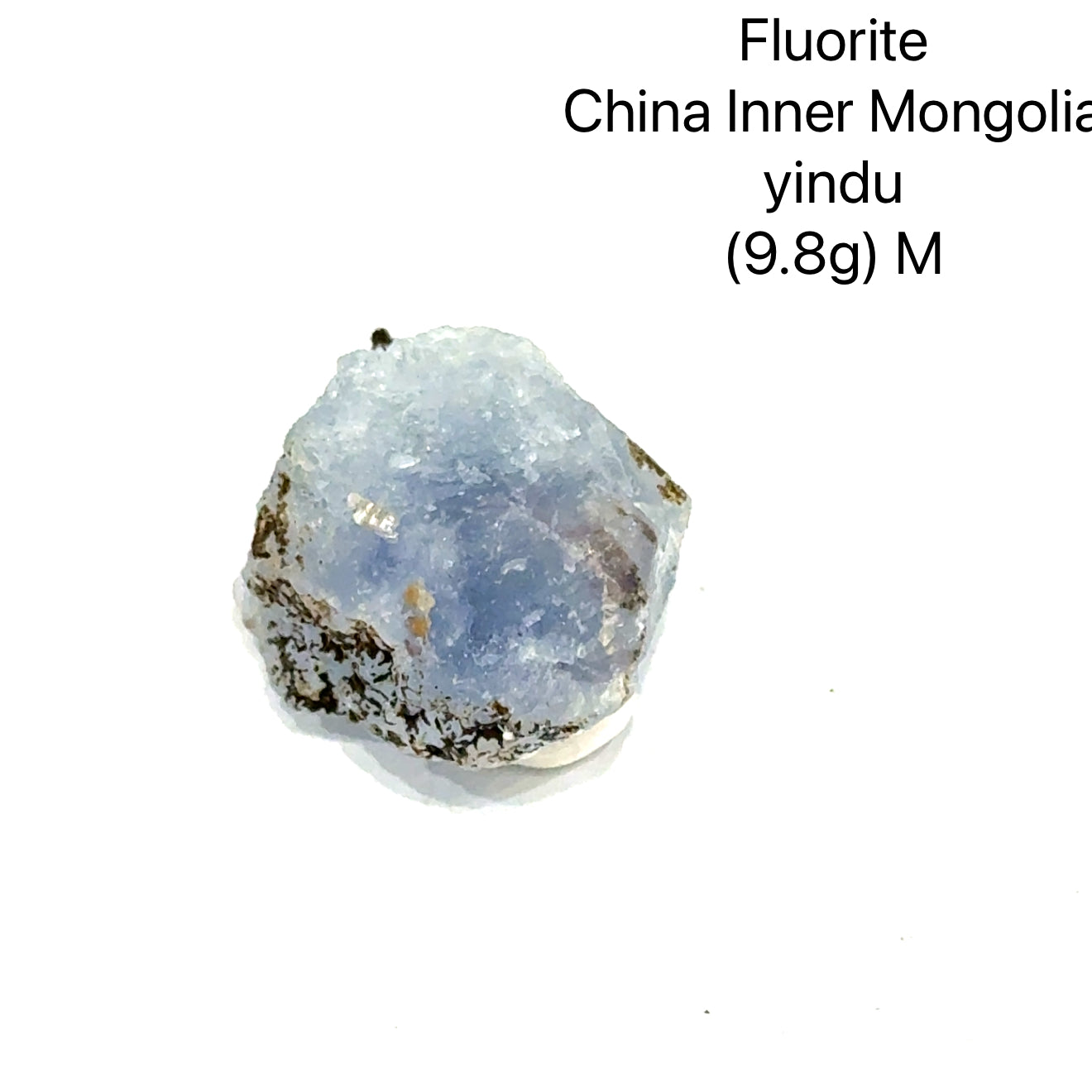 Fluorite crystal from China, Inner Mongolia, with weight and origin information on a white background, (9.8g) M front view. 