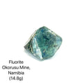 Fluorite crystal from Okorusu Mine, Namibia, on a white background (14.8g), front view. 