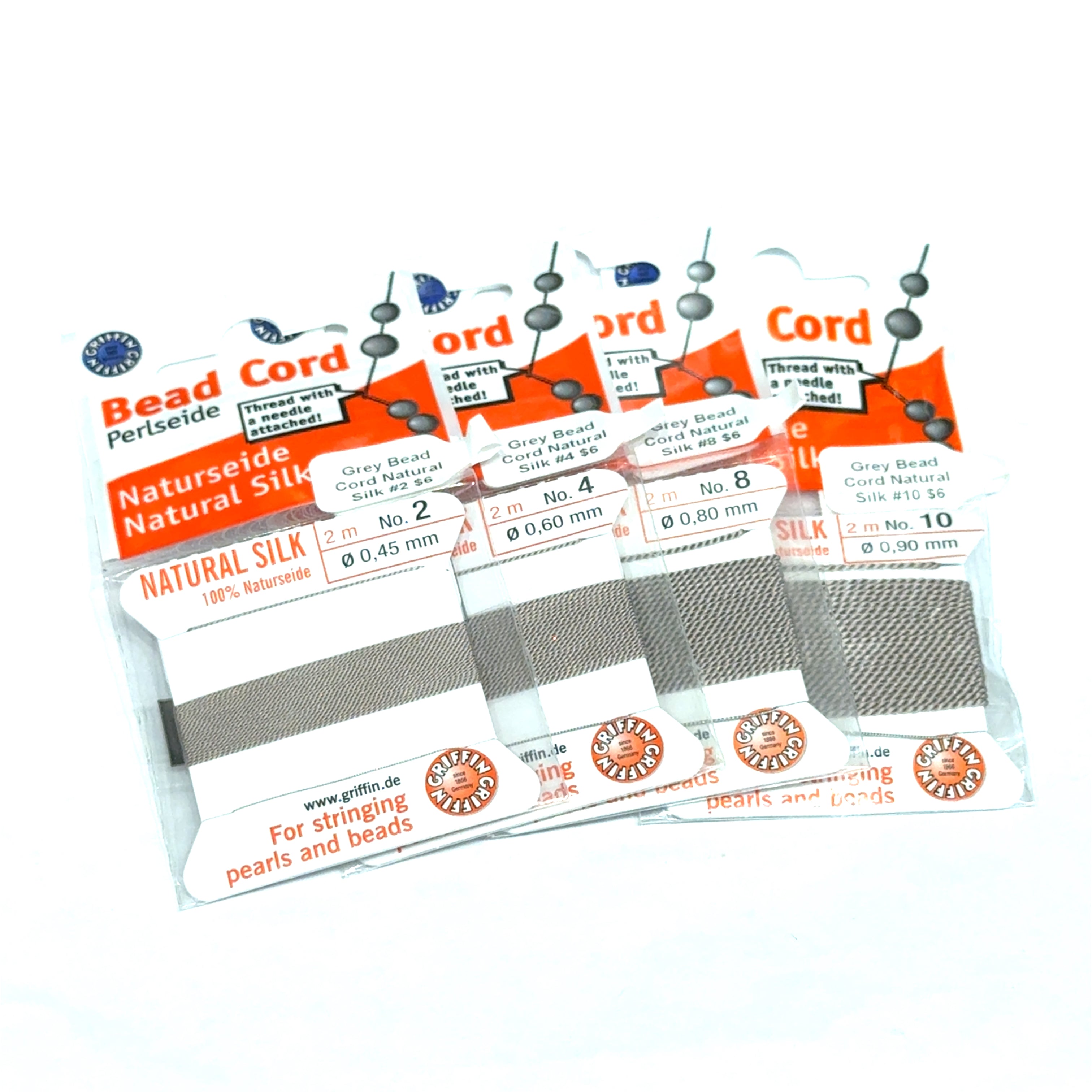 Four packages of Grey Natural Silk Bead Cord  #2, 4,  8, & 10 on a white background, front view.