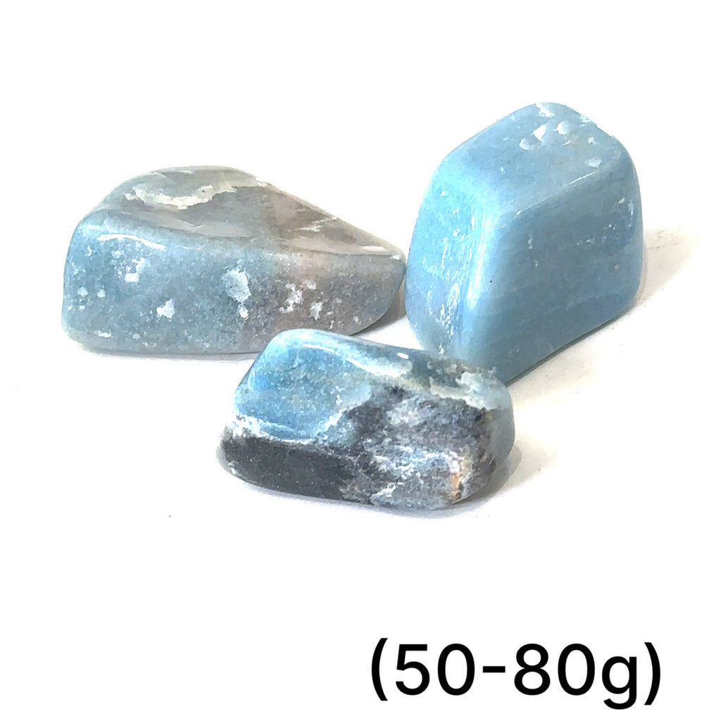 Free‑form Trolleite gemstone with calming energy and complimentary information card (50-80g) on white front overview