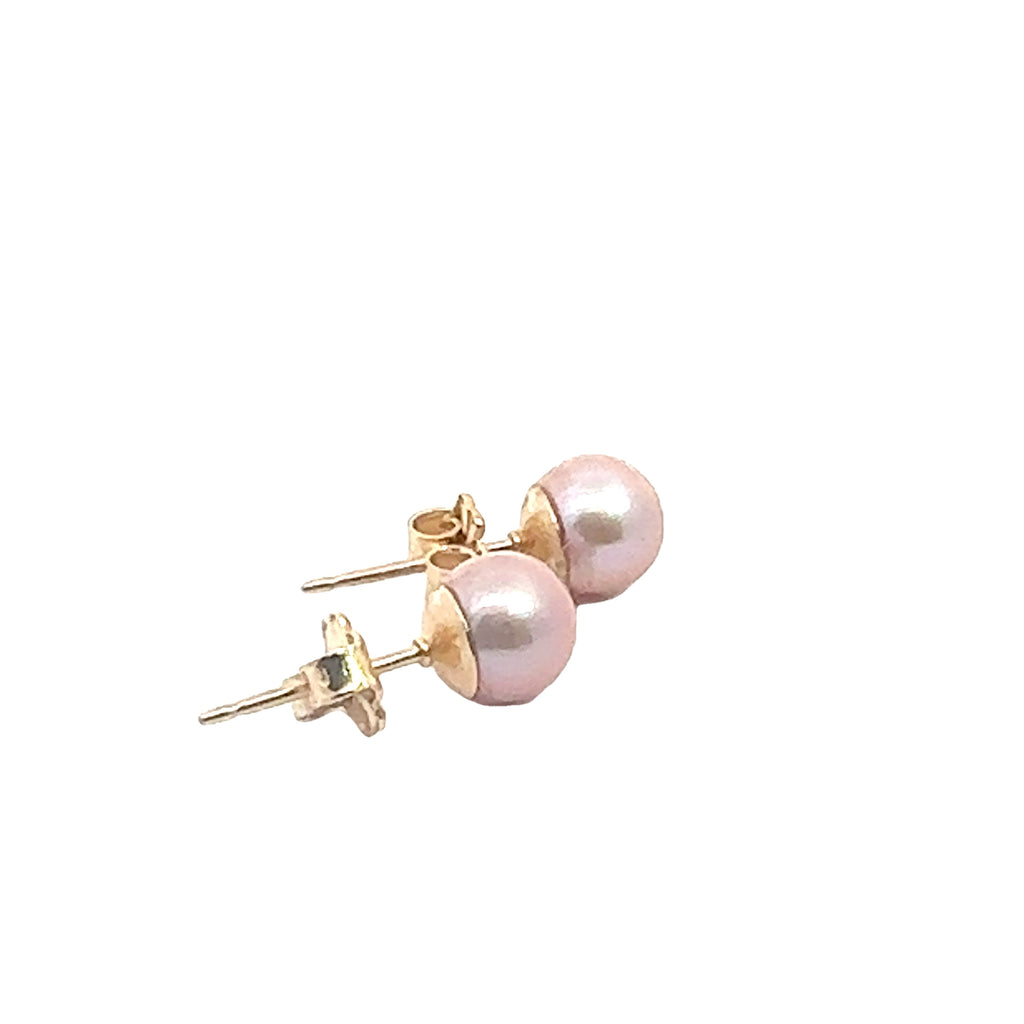 Freshwater Cultured Natural Pink Pearl Stud Earrings on white side angle overview