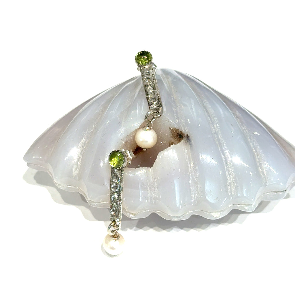 Freshwater Pearl & Peridot Gemstone Earrings with a gemstone shell on white bottom center overview