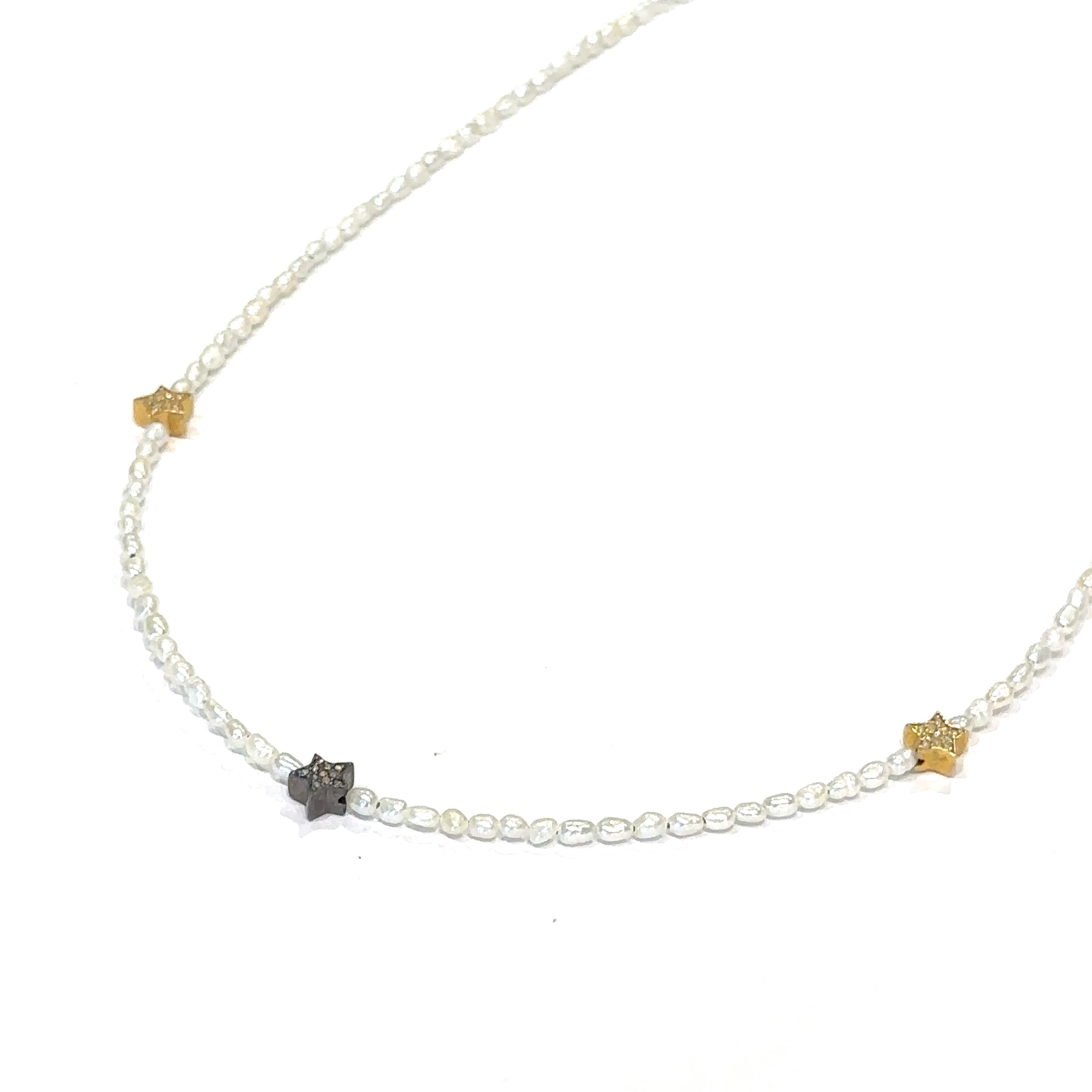 Freshwater pearl necklace with gold‑filled lobster clasp on white front angle view
