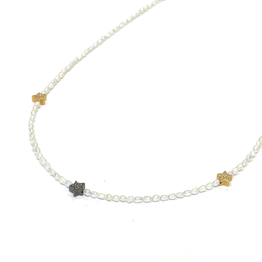 Freshwater pearl necklace with gold‑filled lobster clasp on white front angle view