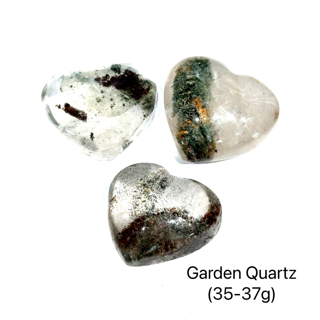 Garden Quartz Heart Carving grouping on white 35-37g overview