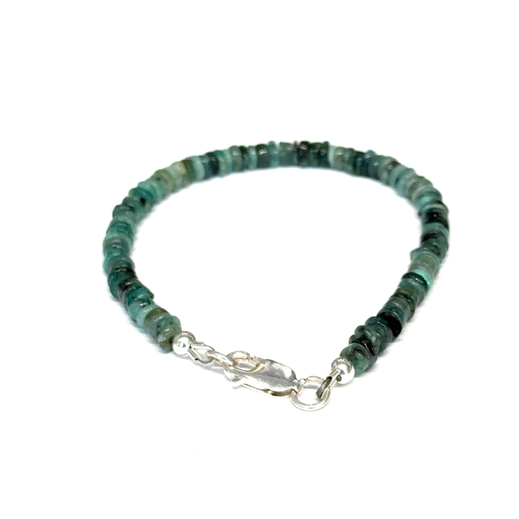 Genuine Emerald Bracelet on white  center front, close-up view
