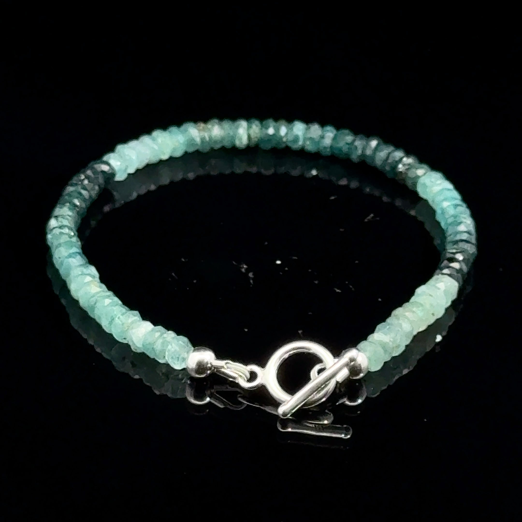 Genuine Grandidierite Gemstone Bracelet  on black  back overview