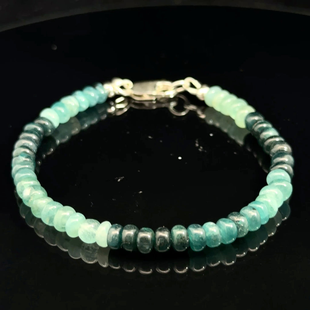 Genuine Grandidierite Gemstone Bracelet  on black center overview