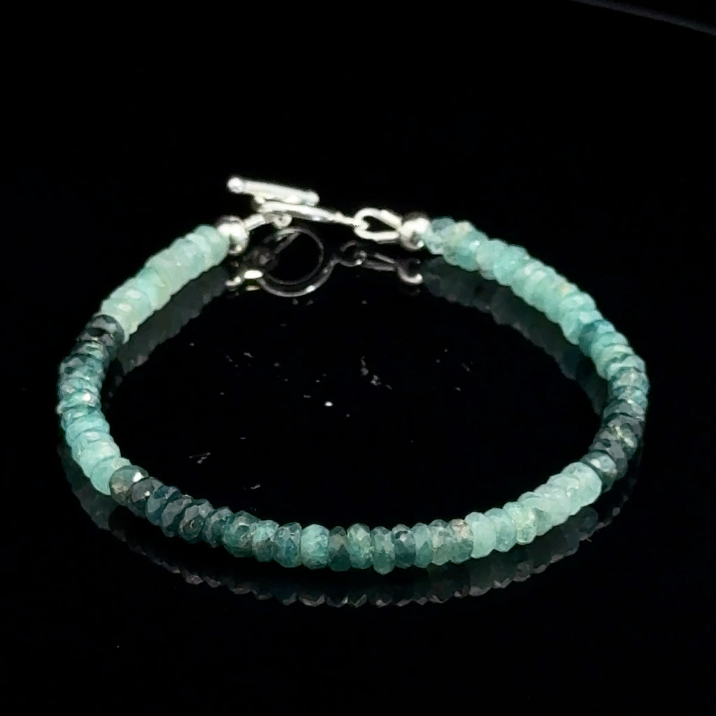 Genuine Grandidierite Gemstone Bracelet  on black front  close up overview