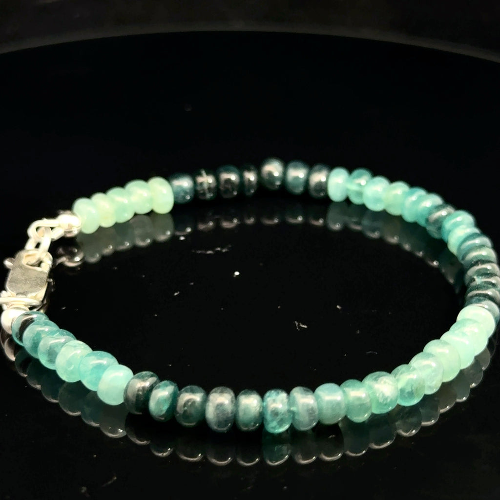 Genuine Grandidierite Gemstone Bracelet  on black right side overview