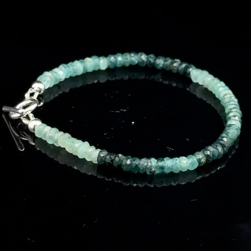 Genuine Grandidierite Gemstone Bracelet  on black  right side view