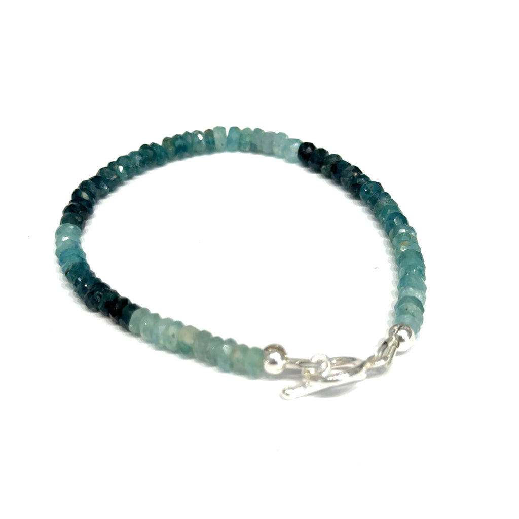 Genuine Grandidierite Gemstone Bracelet  on white bottom left side overview