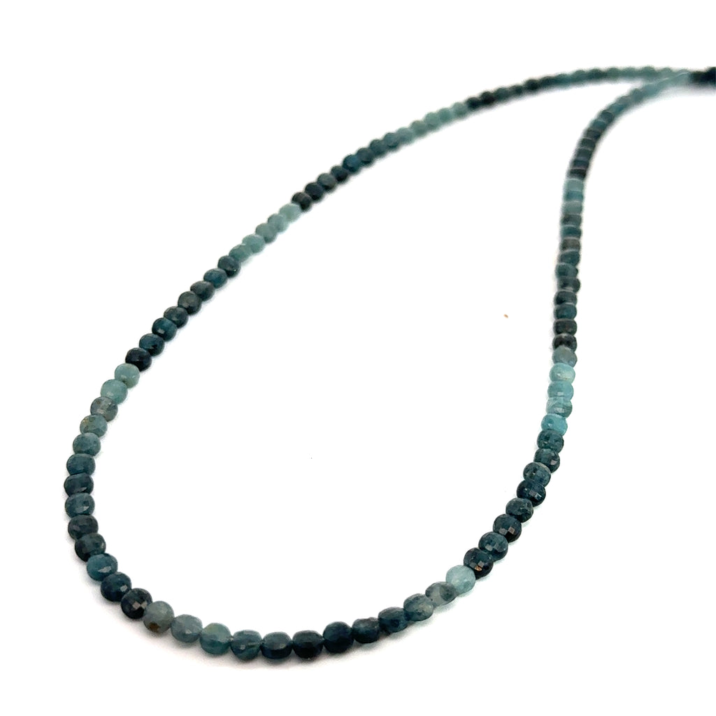Genuine Grandidierite Gemstone Necklace on white, up close bottom up overview