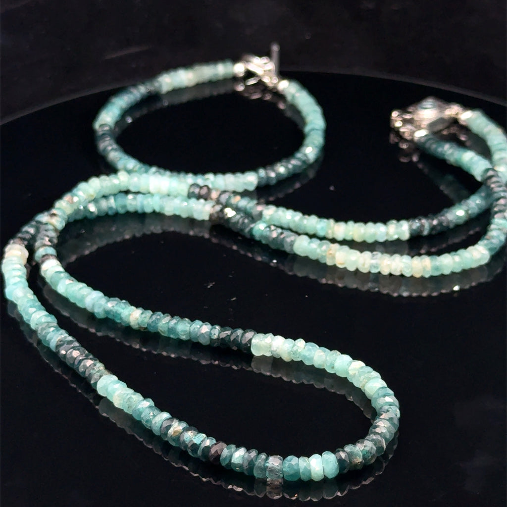 Genuine Grandidierite Gemstone Necklace with matching bracelet on black up close up  of front overview