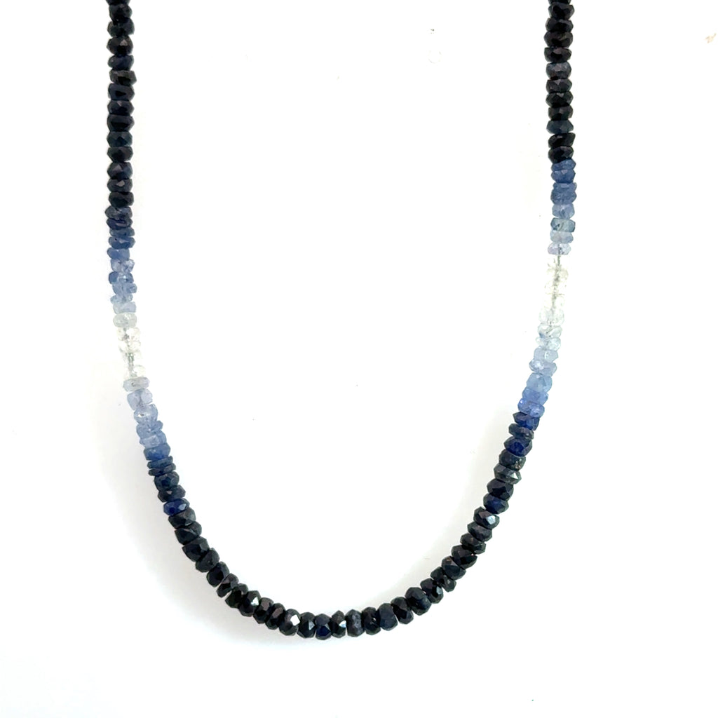 Genuine Sapphire gemstone necklace with a sterling silver toggle clasp by Hidden Jewel on a white background, center long, hanging overview.