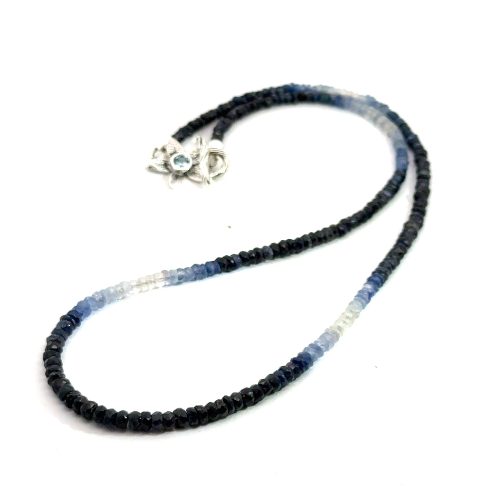 Genuine Sapphire gemstone necklace with sterling silver toggle clasp by Hidden Jewel on a white background center overview.
