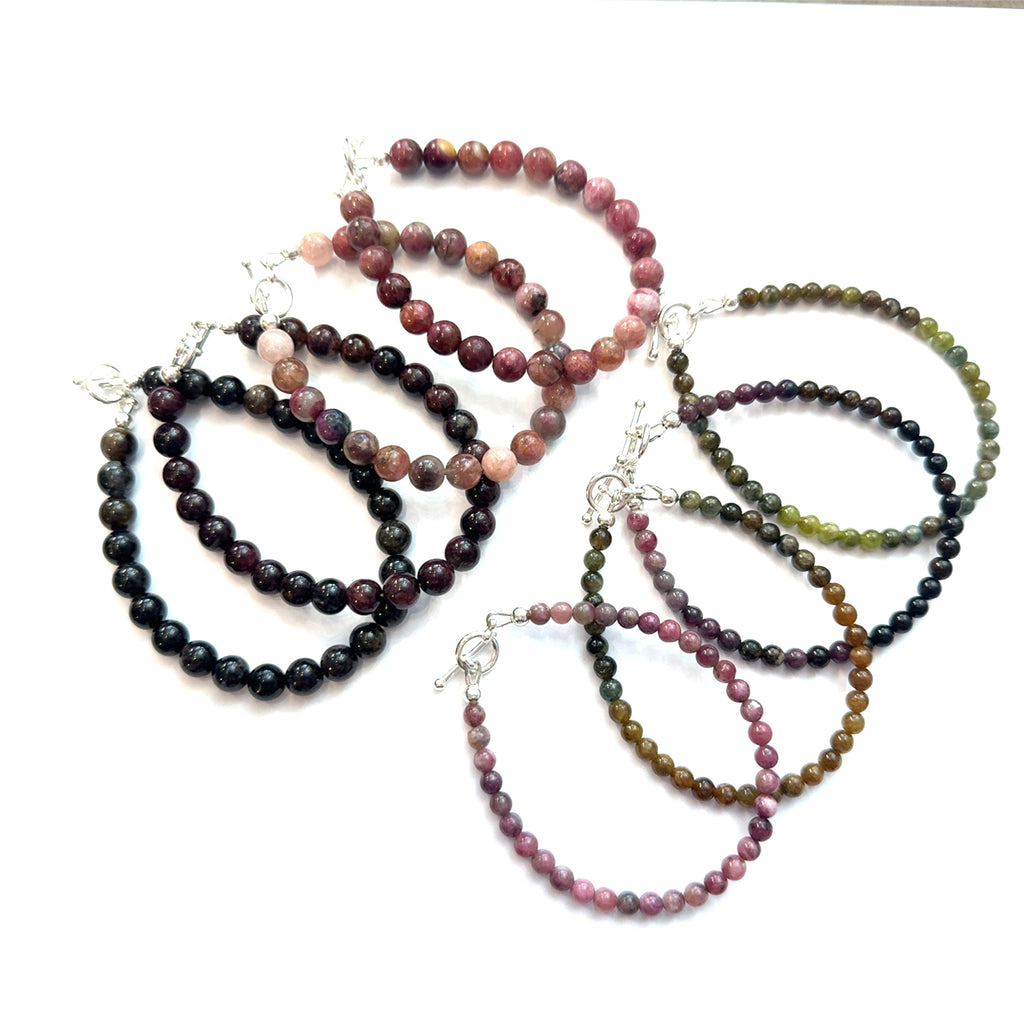 Genuine Watermelon Tourmaline Gemstone Bracelet on white grouping center overview