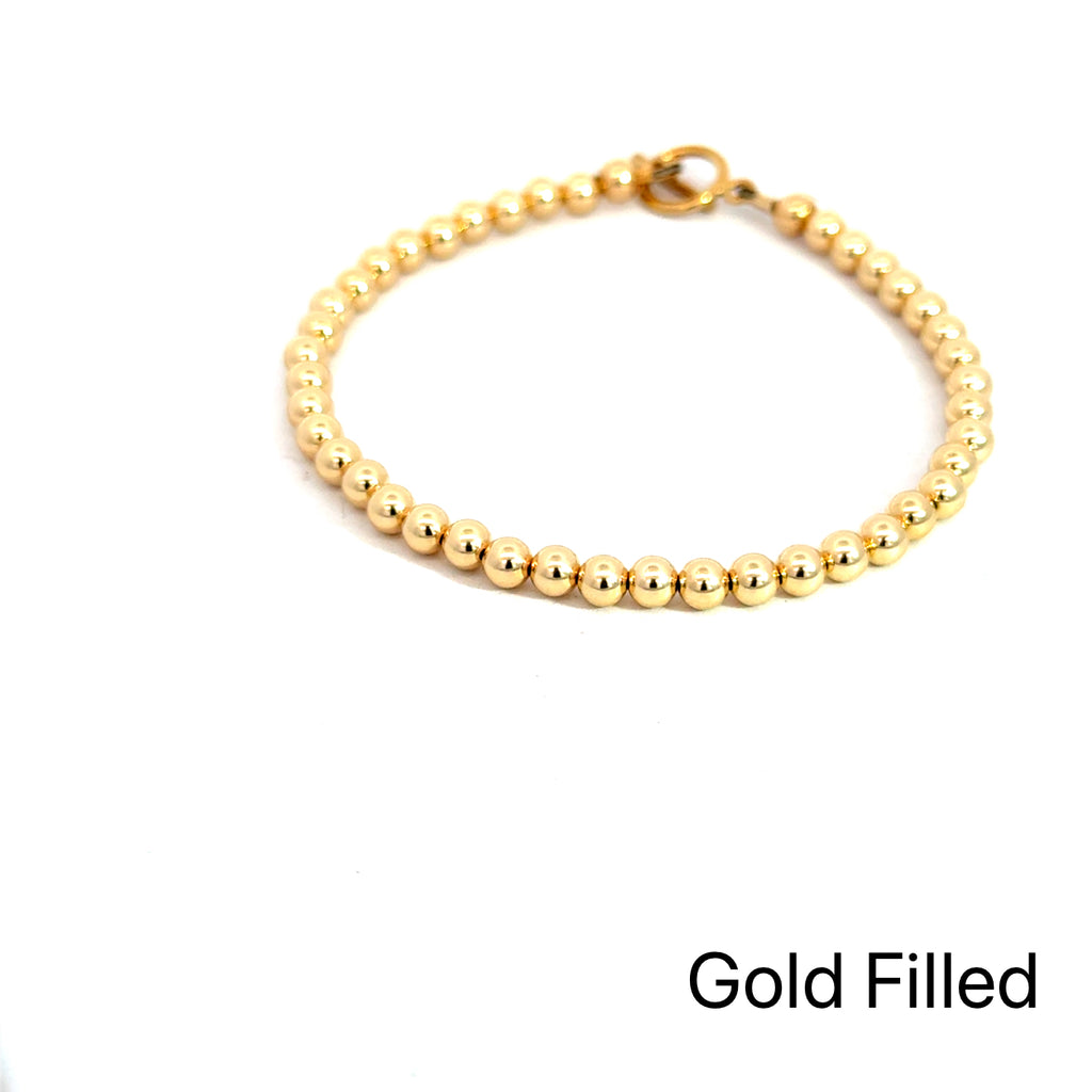 Gold, Rose Gold & Silver Faceted Bead Bracelet gold filled  on white front overview