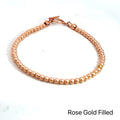 Gold, Rose Gold & Silver Faceted Bead Bracelet rose gold  on white front overview