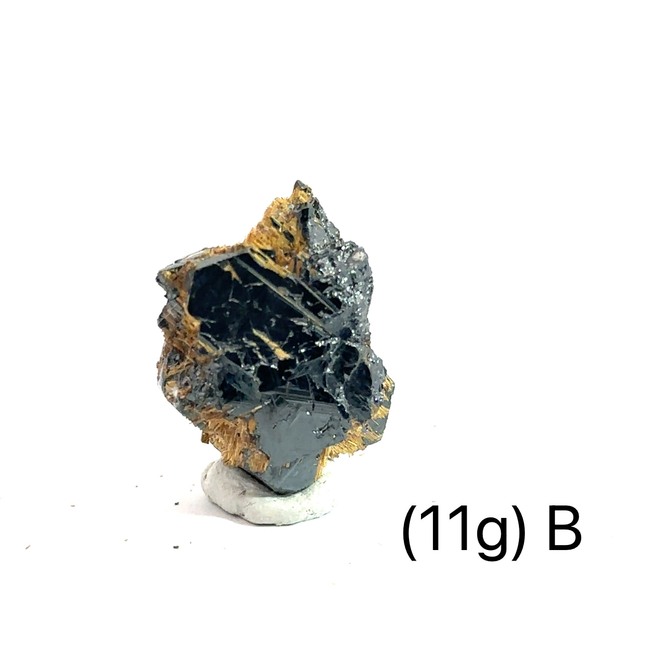 Golden Rutile with Hematite Raw Gemstone (11g )B on white overview