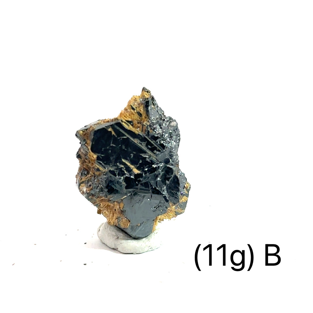 Golden Rutile with Hematite Raw Gemstone (11g )B on white overview