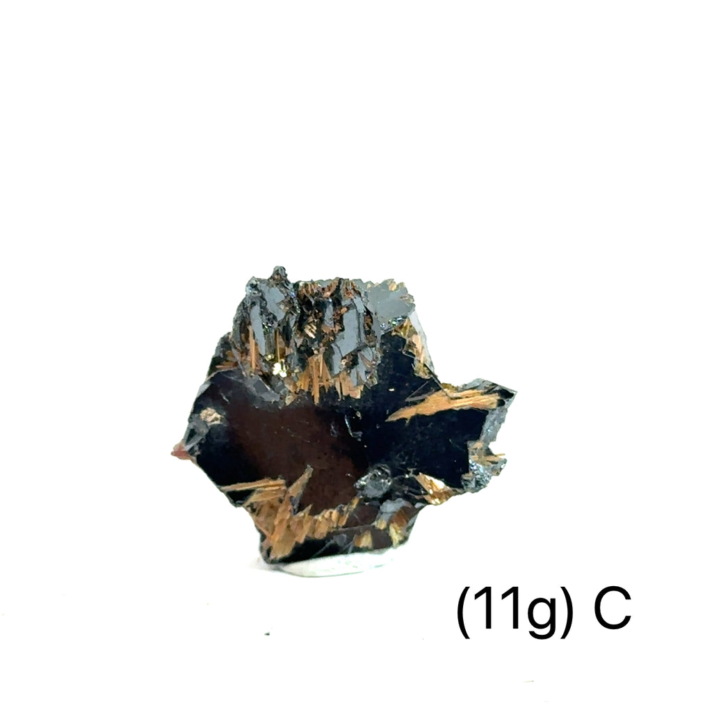 Golden Rutile with Hematite Raw Gemstone (11g) C on white overview